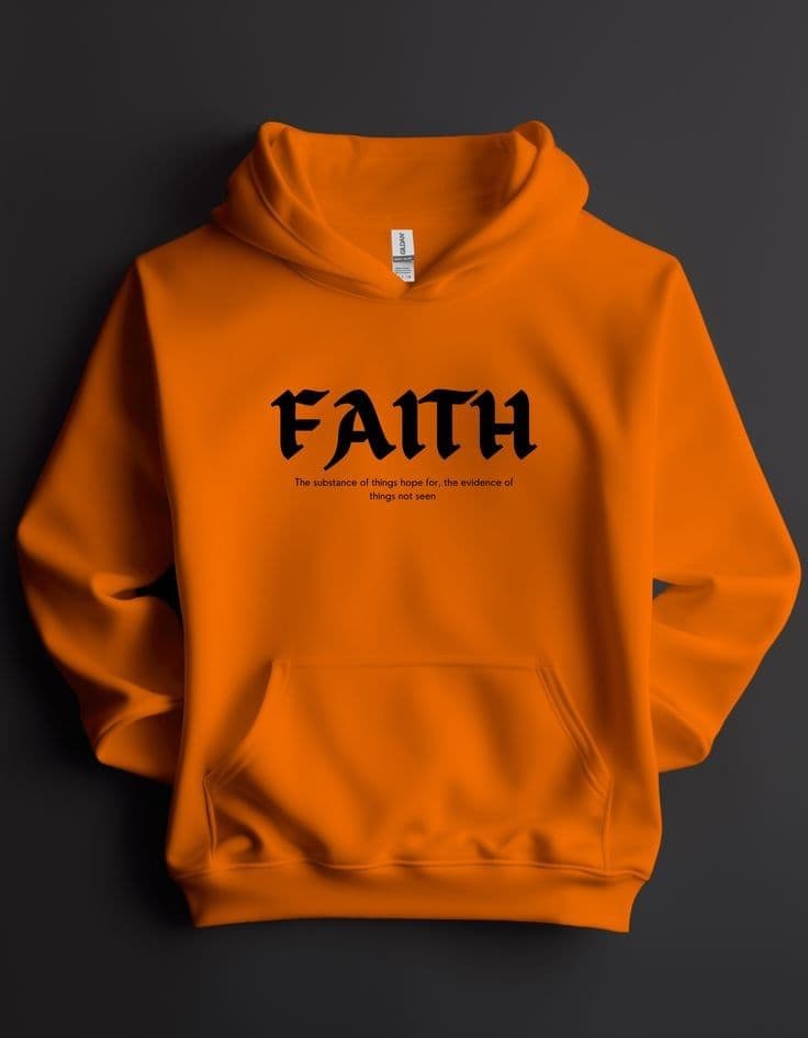 Orange Faith sweatshirt on a hanger